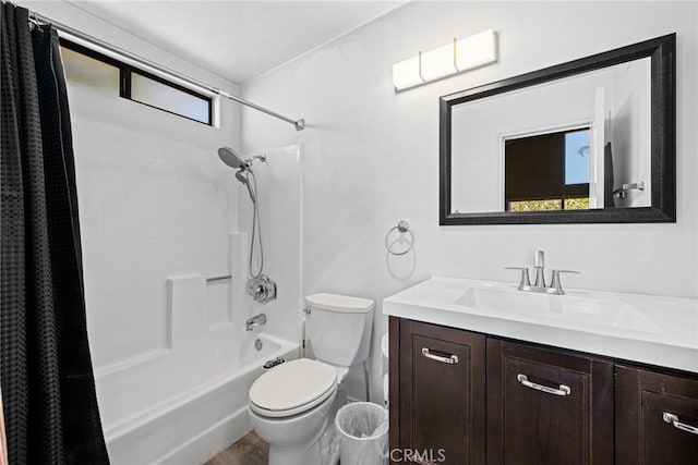 full bathroom featuring vanity, shower / bath combination with curtain, and toilet