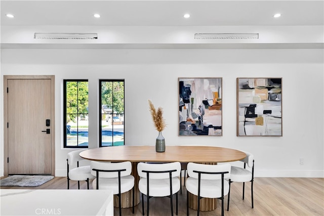 dining area featuring light hardwood / wood-style floors