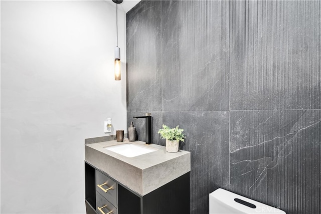 bathroom featuring sink and toilet