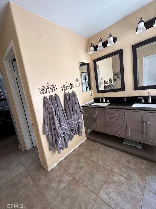 bathroom featuring vanity and tile patterned flooring