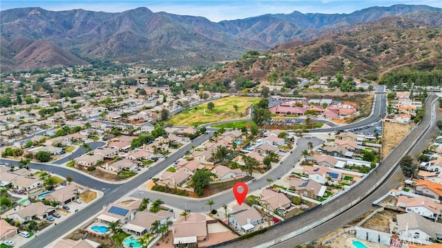 bird's eye view featuring a residential view and a mountain view