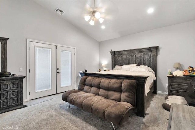 carpeted bedroom featuring visible vents, a ceiling fan, access to outside, vaulted ceiling, and french doors