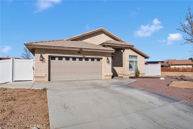 prairie-style house featuring a garage