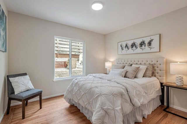 bedroom with light hardwood / wood-style floors