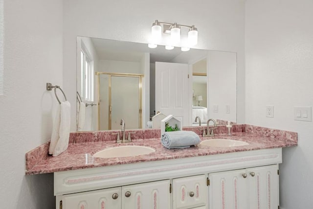 bathroom with vanity and walk in shower