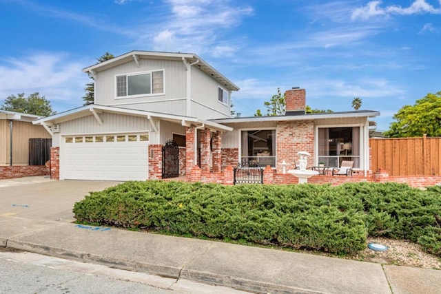 view of front of home with a garage