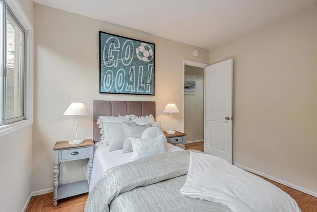 bedroom featuring hardwood / wood-style floors