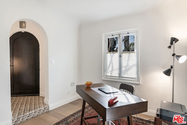 office featuring hardwood / wood-style floors