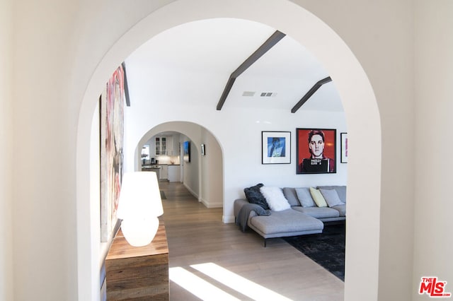 corridor with dark hardwood / wood-style floors