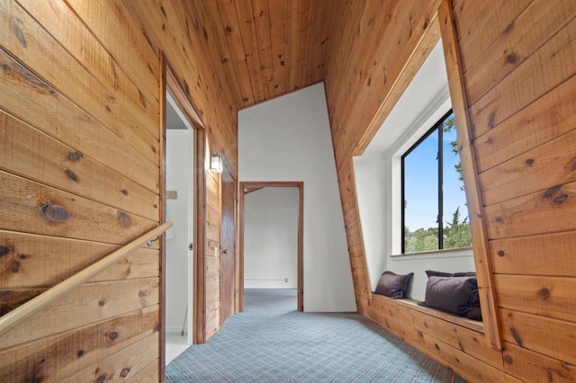 bonus room with wood ceiling, wooden walls, carpet floors, and vaulted ceiling