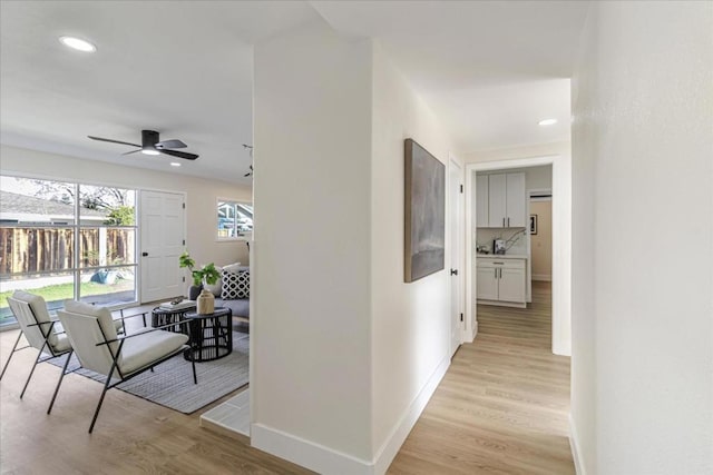 hallway featuring light hardwood / wood-style floors