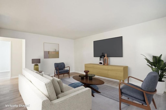 living room with light hardwood / wood-style flooring