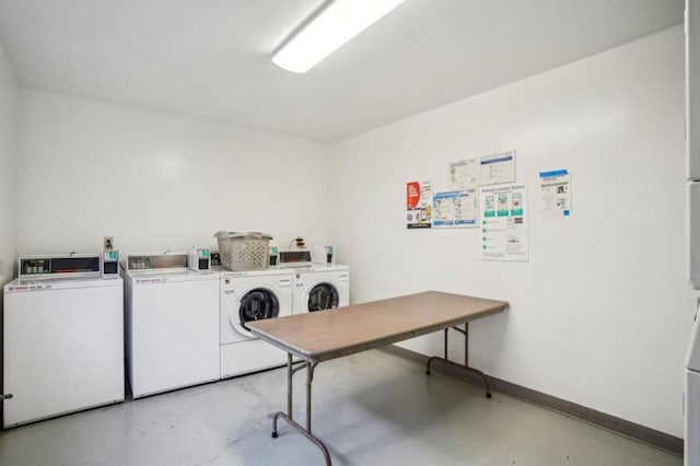 laundry area featuring independent washer and dryer