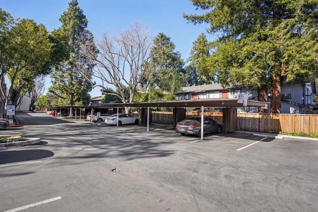 view of parking with a carport