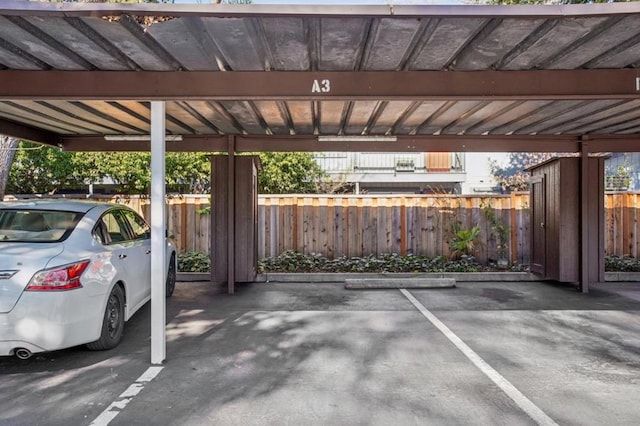 view of parking with a carport