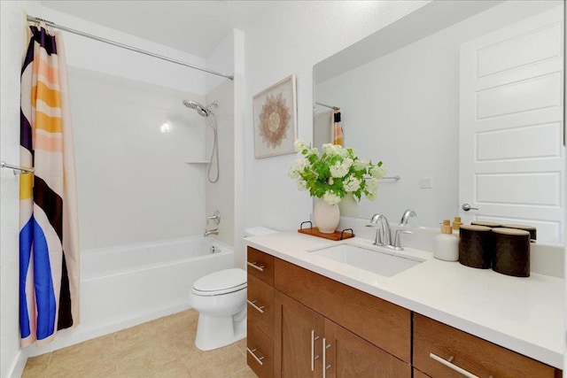 full bathroom with shower / tub combo with curtain, vanity, tile patterned floors, and toilet