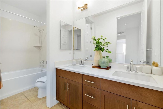 full bathroom with vanity, tile patterned floors, bathtub / shower combination, and toilet