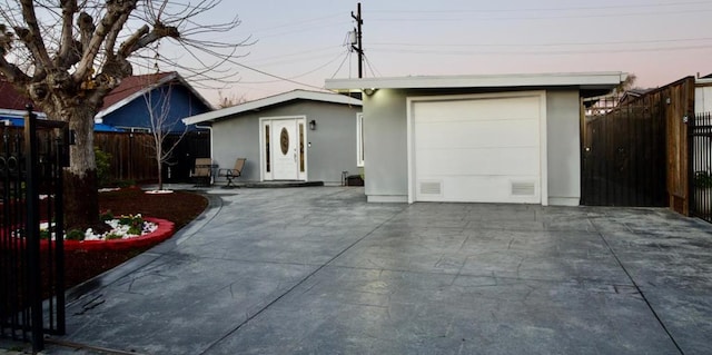 view of front of property with a garage