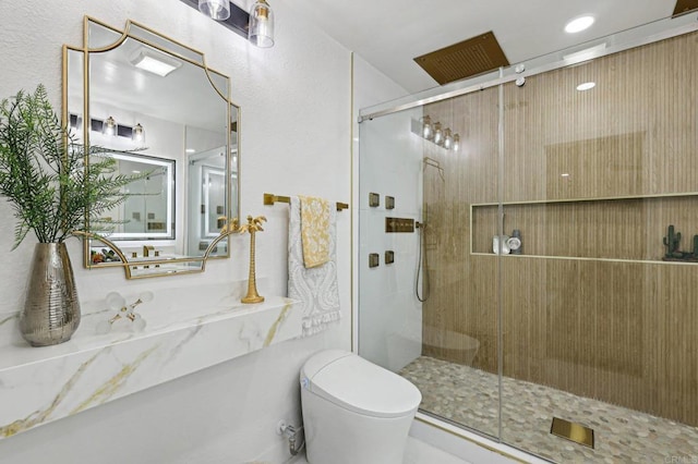 full bathroom featuring a stall shower and toilet