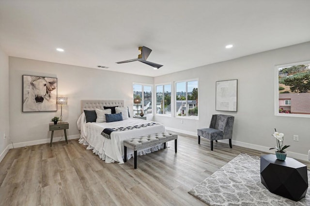 bedroom featuring baseboards, visible vents, a ceiling fan, light wood-type flooring, and recessed lighting