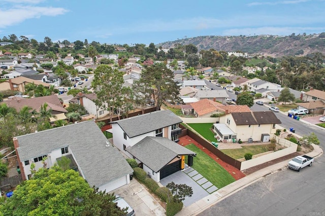 birds eye view of property with a residential view