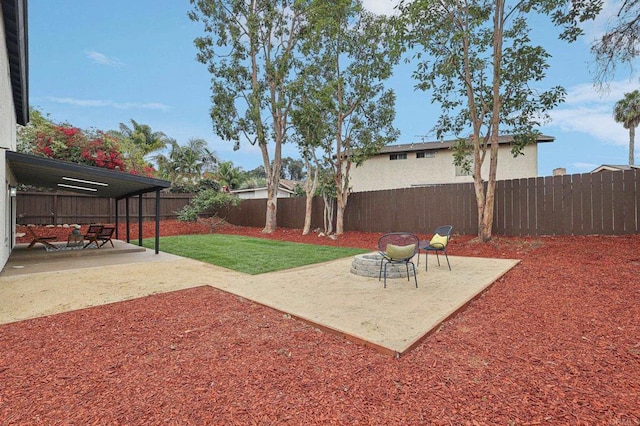 view of yard with a patio and a fenced backyard