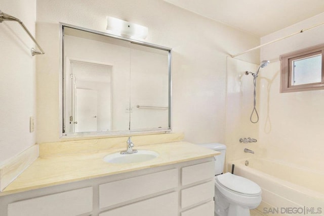 full bathroom with vanity, bathing tub / shower combination, and toilet