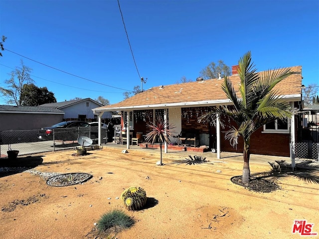 rear view of house featuring a patio area