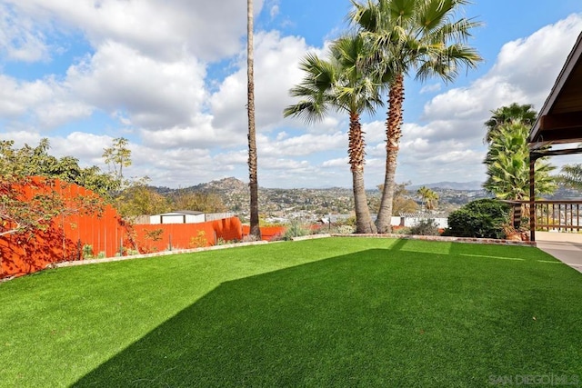 view of yard with a mountain view