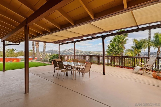 view of patio / terrace with a mountain view