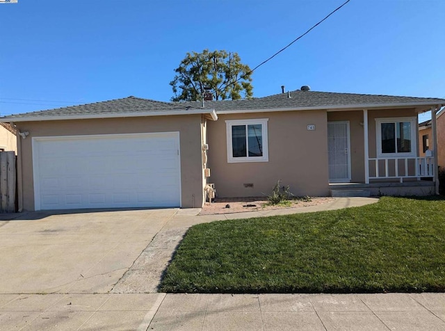 single story home with a garage and a front lawn