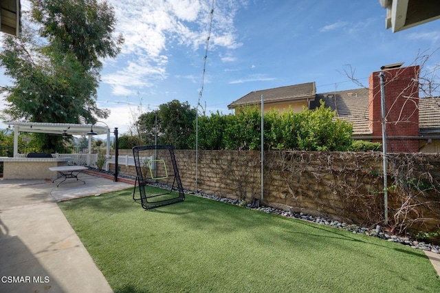 view of yard featuring a pergola and a patio