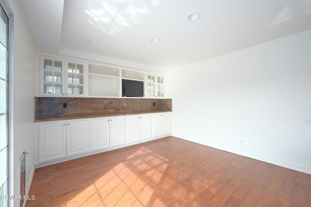 empty room with light hardwood / wood-style floors