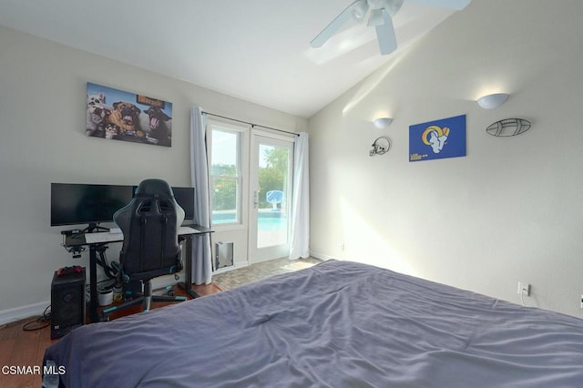 bedroom featuring lofted ceiling, wood-type flooring, and ceiling fan