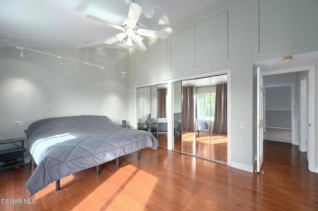 bedroom featuring ceiling fan, high vaulted ceiling, and dark hardwood / wood-style flooring