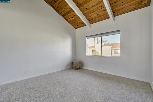 carpeted empty room with beamed ceiling, wooden ceiling, and high vaulted ceiling