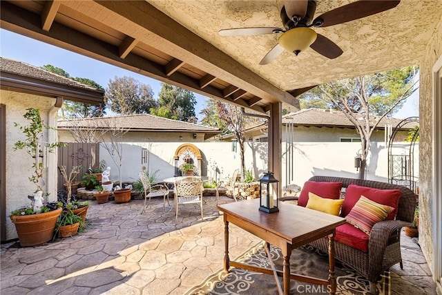 view of patio with ceiling fan