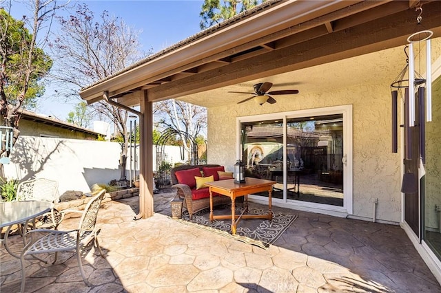 view of patio with ceiling fan