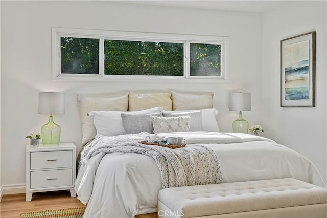 bedroom featuring hardwood / wood-style floors