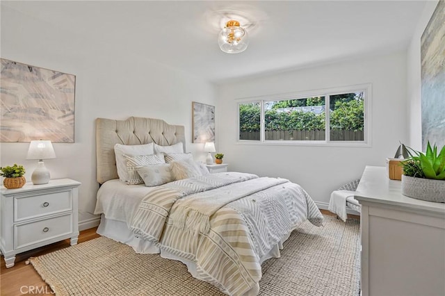 bedroom with light hardwood / wood-style floors