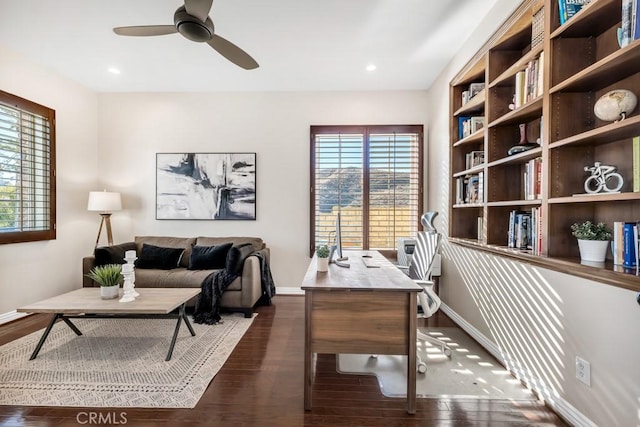 office space with dark hardwood / wood-style floors and ceiling fan