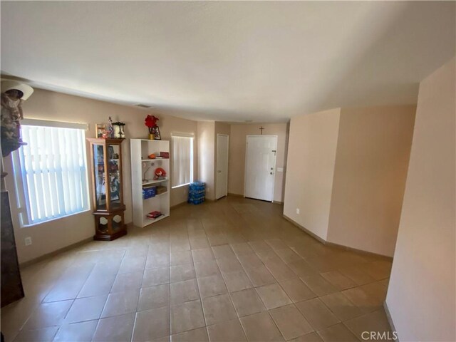 view of tiled spare room