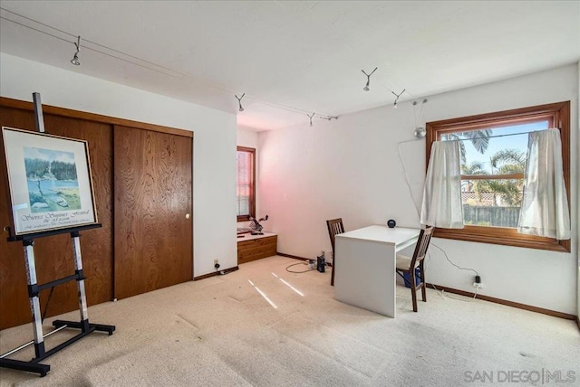 office area with light colored carpet