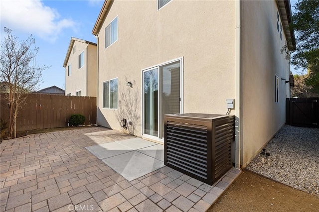 rear view of property featuring a patio area