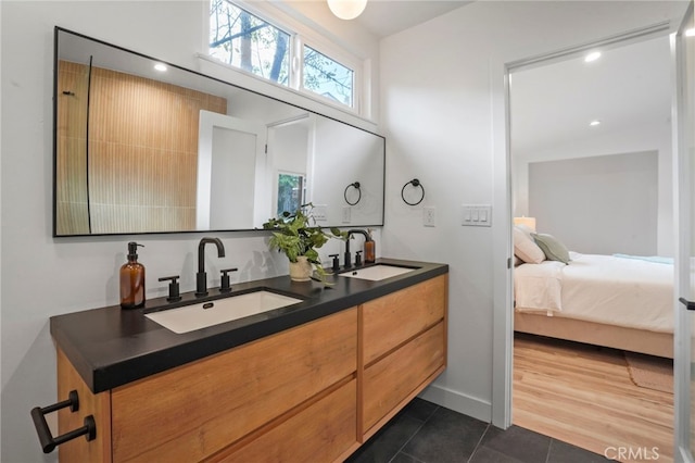 bathroom featuring vanity and tile patterned floors