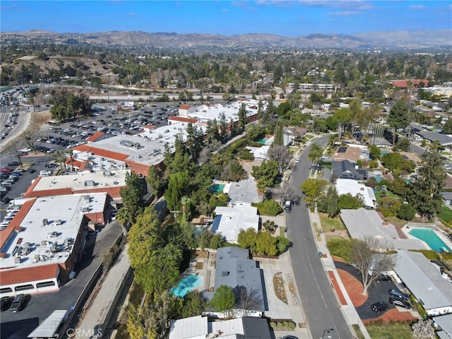 drone / aerial view featuring a mountain view