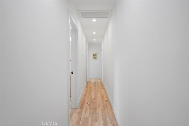 hallway with light wood-type flooring