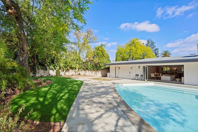 view of pool featuring an outdoor hangout area and a patio