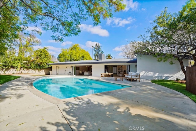 view of pool featuring an outdoor hangout area and a patio area