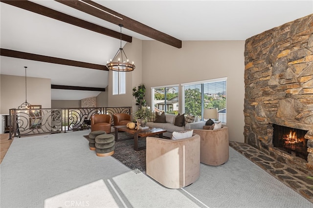 living room with high vaulted ceiling, a chandelier, light carpet, a stone fireplace, and beamed ceiling